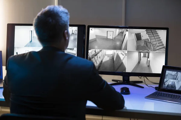 Side View Mature Businessman Looking Cctv Camera Footage Multiple Computer — Stock Photo, Image