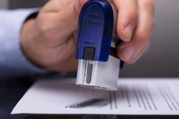 Close Businessperson Hand Stamping Document — Stock Photo, Image