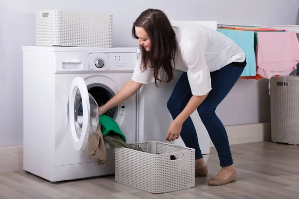 Side View Young Woman Loading Clothes Washing Machine — Stock Photo, Image