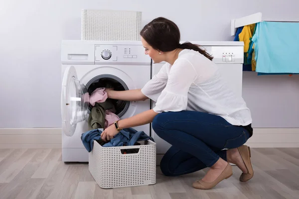Side View Young Woman Loading Clothes Washing Machine — Stock Photo, Image