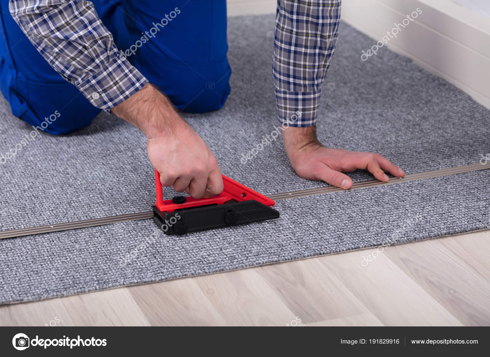 Close Male Carpet Hand Fitter, Laying Carpet Next To Tile