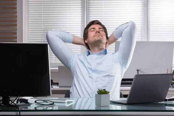 Tired Young Businessman Stretching His Arms Workplace — Stock Photo, Image