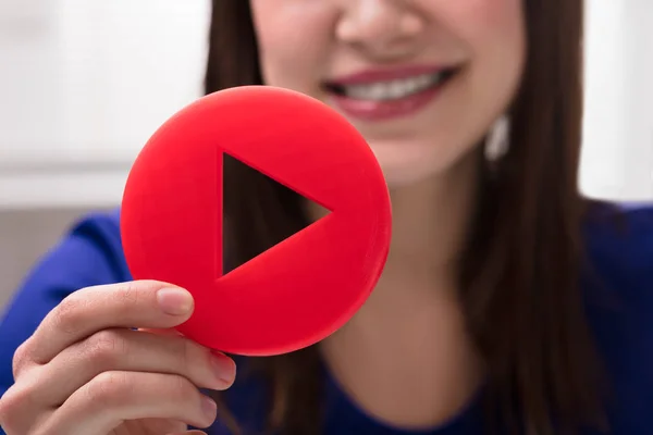 Close Woman Hand Holding Red Play Icon — Stock Photo, Image