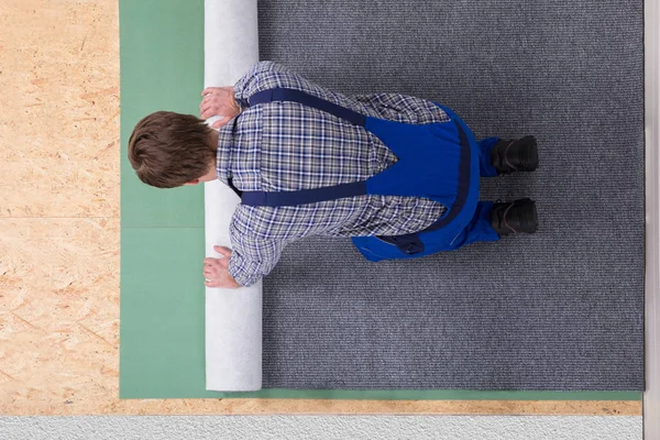 Side View Young Man Worker Overalls Installera Matta — Stockfoto