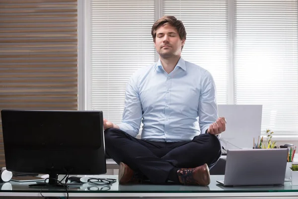 Young Businessman Sitting Desk Meditating Office — Stock Photo, Image