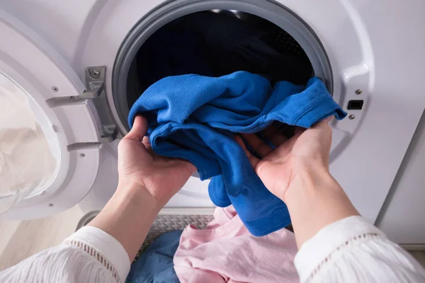 Close Woman Hand Putting Dirty Blue Cloth Washing Machine — Stock Photo, Image