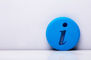 Photo Of Blue Information Icon On White Background clipart