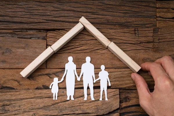 Close Person Hand Making Wooden Dominoes Blocks Roof White Cutout — Stockfoto