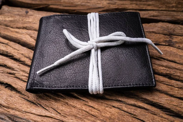 High Angle View Black Leather Wallet Tied White Lace Wooden — Stock Photo, Image
