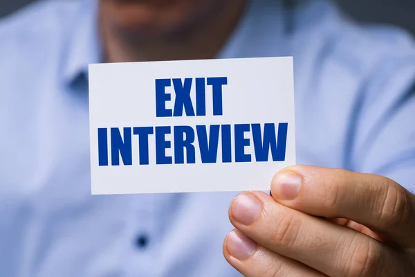 Man Showing Card Exit Interview Text — Stockfoto