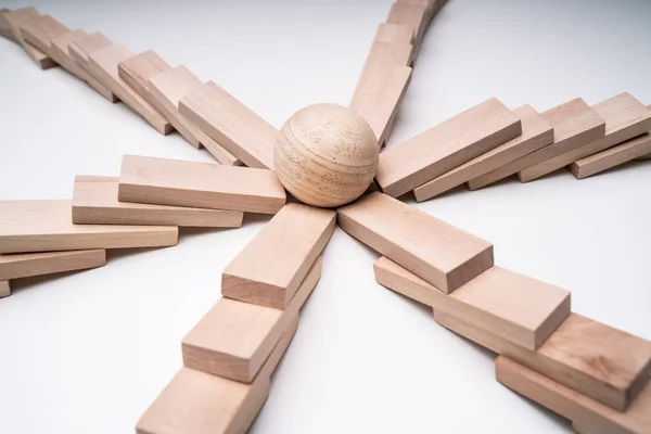 Close Silver Ball Center Collapsed Wooden Dominoes White Backdrop — Stock Photo, Image