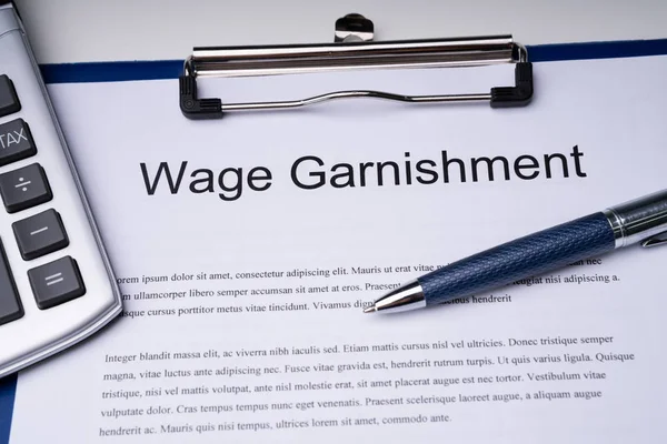 High Angle View Wage Garnishment Documents Calculator Pen Clipboard — Stock Photo, Image