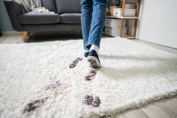 Elevated View Person Walking Muddy Footprint Carpet — Stock Photo, Image