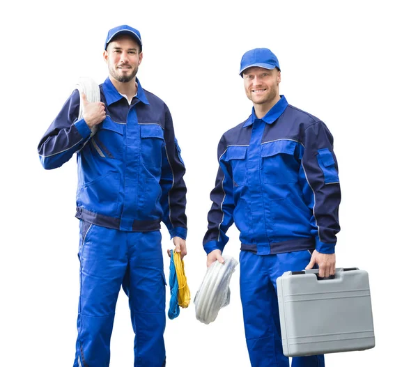 Retrato Joven Sonriente Electricista Masculino Sosteniendo Equipo Cuerda Contra Fondo —  Fotos de Stock