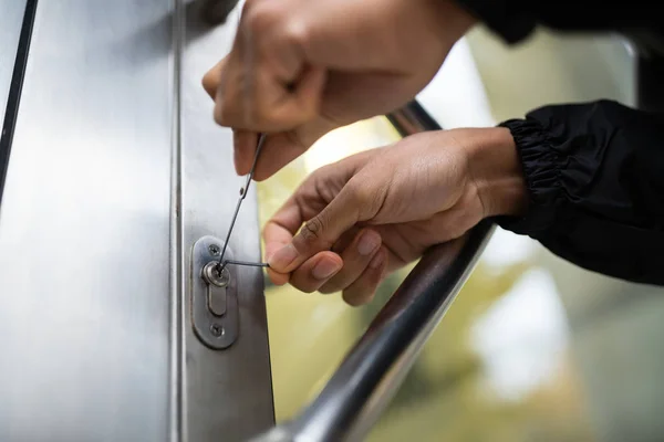 Mature Male Lockpicker Fixing Door Handle Home — Stock Photo, Image