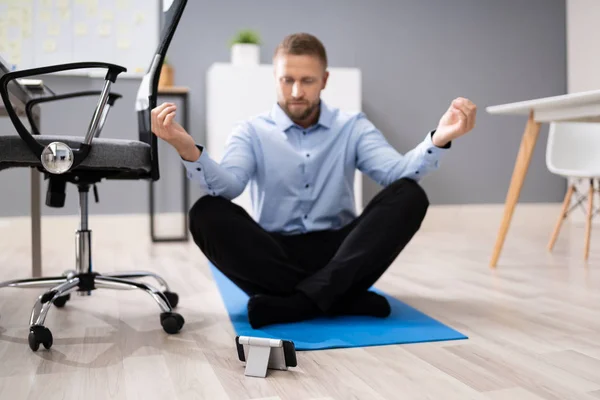 Businessman Meditating Using Smartphone App Office — Stock Photo, Image