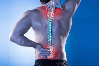 Young Man With Pain In His Back clipart