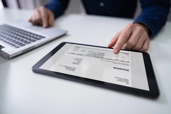 Close Businessperson Hand Analyzing Bill Digital Tablet Desk — Stock Photo, Image