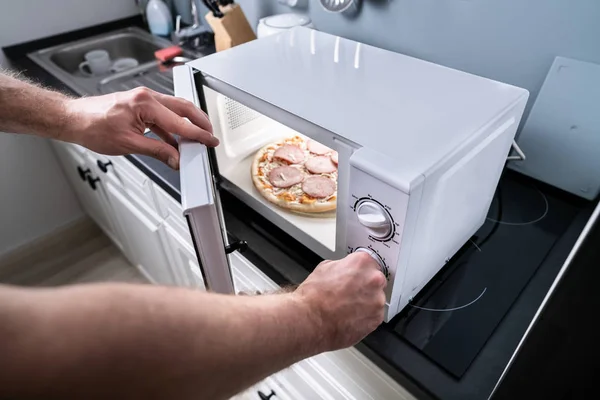 Human Hand Baking Pizza Microwave Oven — Stock Photo, Image