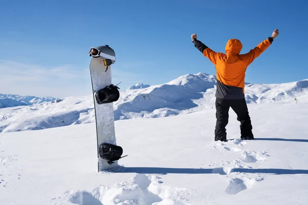 Successful Man Clenching His Fist Standing Snow Sports Accessories Mountains — Stock Photo, Image