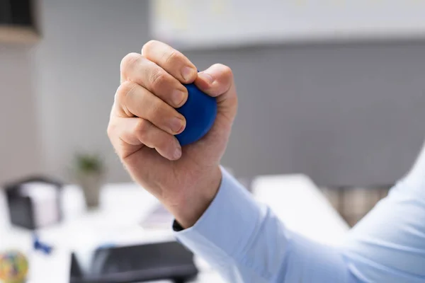 Närbild Person Handen Håller Blå Stressball — Stockfoto