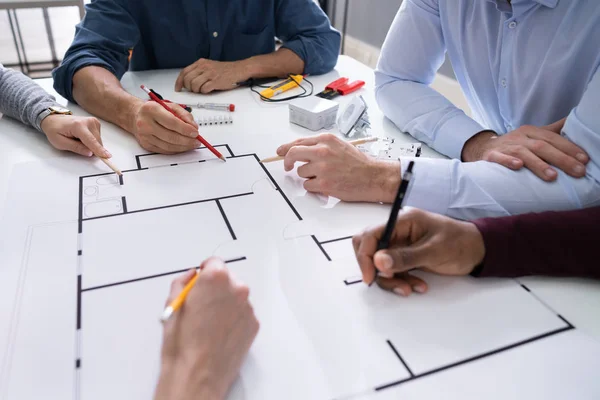 Elevated View Of An Architects Drawing Plan On Blueprint With Electrical Components