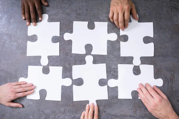 High Angle View Businesspeople Hands Solving Jigsaw Puzzle — Stock Photo, Image