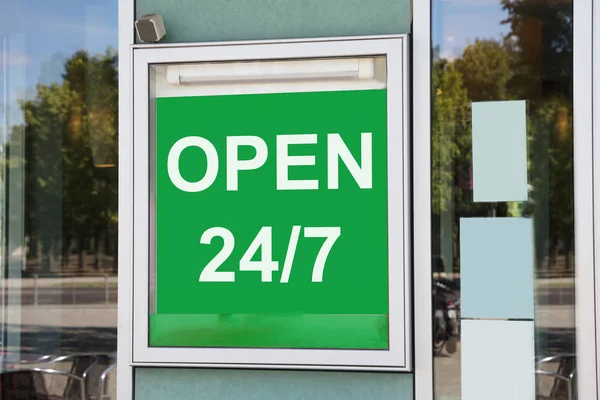 Close Green Open Information Board Hanging Glass Door — Stock Photo, Image