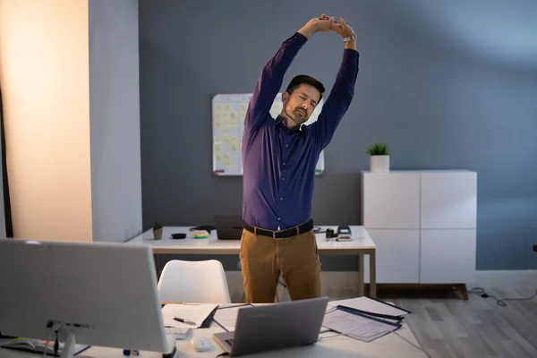 Young Businessman Doing Stretching Exercise Office — 스톡 사진