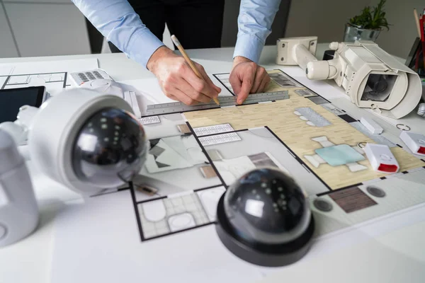 Close Architect Hand Drawing Blueprint Security Equipment Desk — Stock Photo, Image