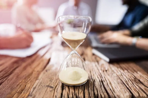 Close Hourglass Front Businesspeople Working Office — Stock Photo, Image