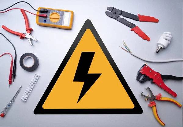 Various Electrician Tools Set High Voltage Sign Gray Background — Stock Photo, Image