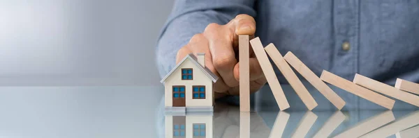 Close Human Hand Stopping Wooden Blocks Falling House Model — Stock Photo, Image