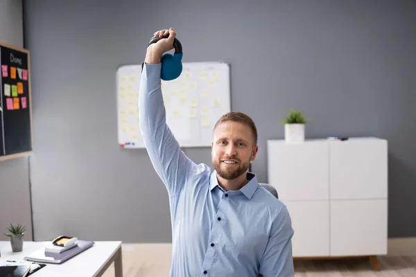 Attractive Businessman Exercising Kettlebell Office — 스톡 사진
