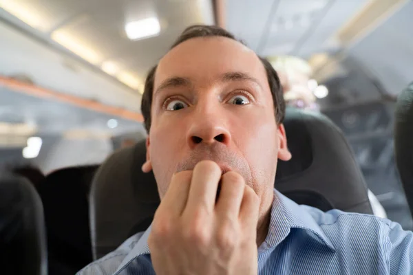 Joven Hombre Teniendo Ataque Ansiedad Avión —  Fotos de Stock