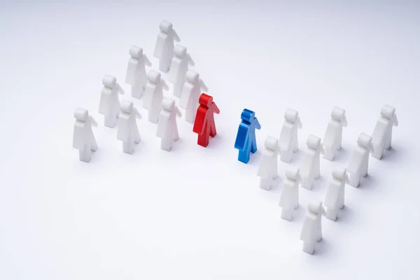 Two Groups Pawns Coming Together Merging Table — Stock Photo, Image