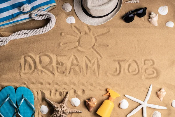 Dream Job Written On Sand By Sea At Beach