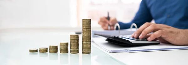 Stacked Coins Armeted Office Desk — 스톡 사진