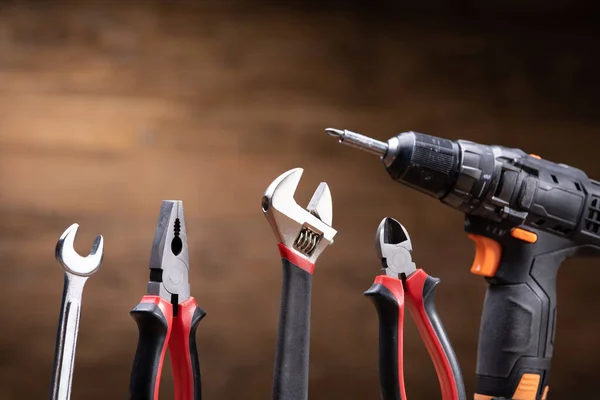 Werkzeuge Wie Zange Monkey Spanner Und Schraubenschlüssel Auf Holz Hintergrund — Stockfoto