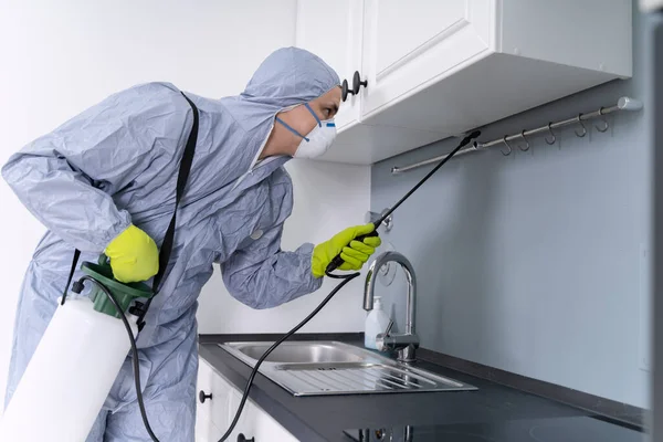 Side View Exterminator Workwear Spraying Pesticide Kitchen Pest Control — Stock Photo, Image