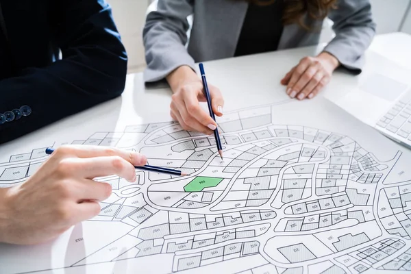 Close Human Hand Holding Pencil Paper Cadastre Map — Stock Photo, Image