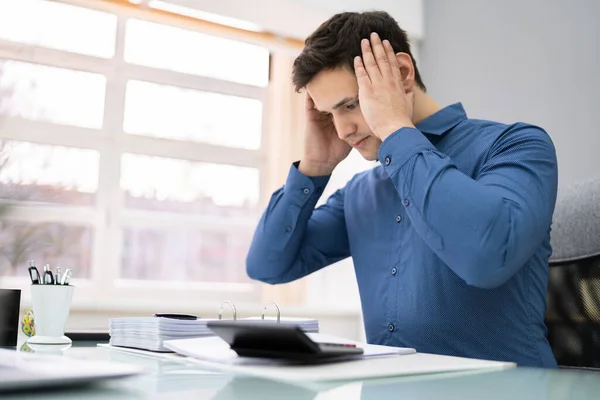 Tensed Young Businessman Calculating Tax Desk Office — Stock Photo, Image