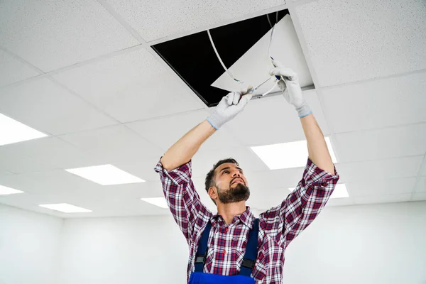 Full Length Portrait Electrician Stepladder Installs Lighting Ceiling Office — Stock Photo, Image