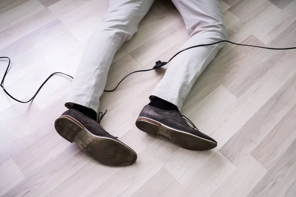 Elevated View Man Stumbling Electrical Cord — Stock Photo, Image