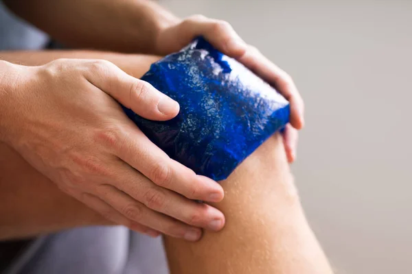 Midsection Man Holding Cool Gel Pack Knee Pain Relief White — Stock Photo, Image