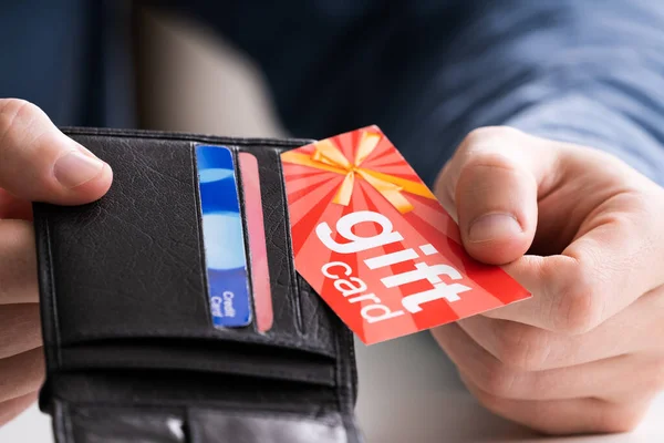 Close Human Hand Removing Red Gift Card Wallet — Stock Photo, Image