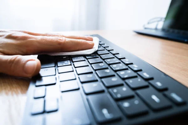 Man Wiping Computer Keyboard Sanitizer Virus Infection — Stock fotografie