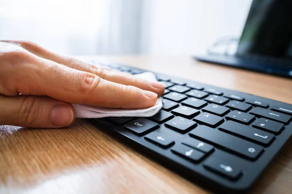 Man Wiping Computer Keyboard Sanitizer Virus Infection — Stock fotografie