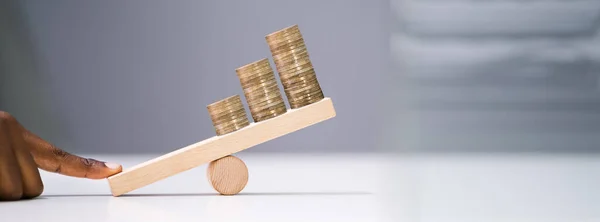 Close Businessperson Balancing Increasing Stacked Coins Finger Seesaw — Stock Photo, Image