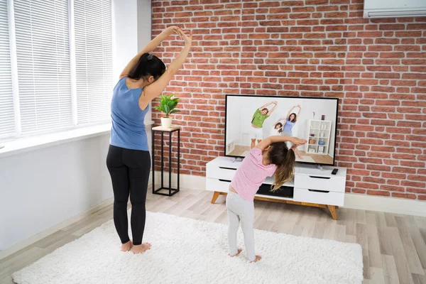 Fit Family Doing Home Online Yoga Fitness Exercise — Stock Photo, Image